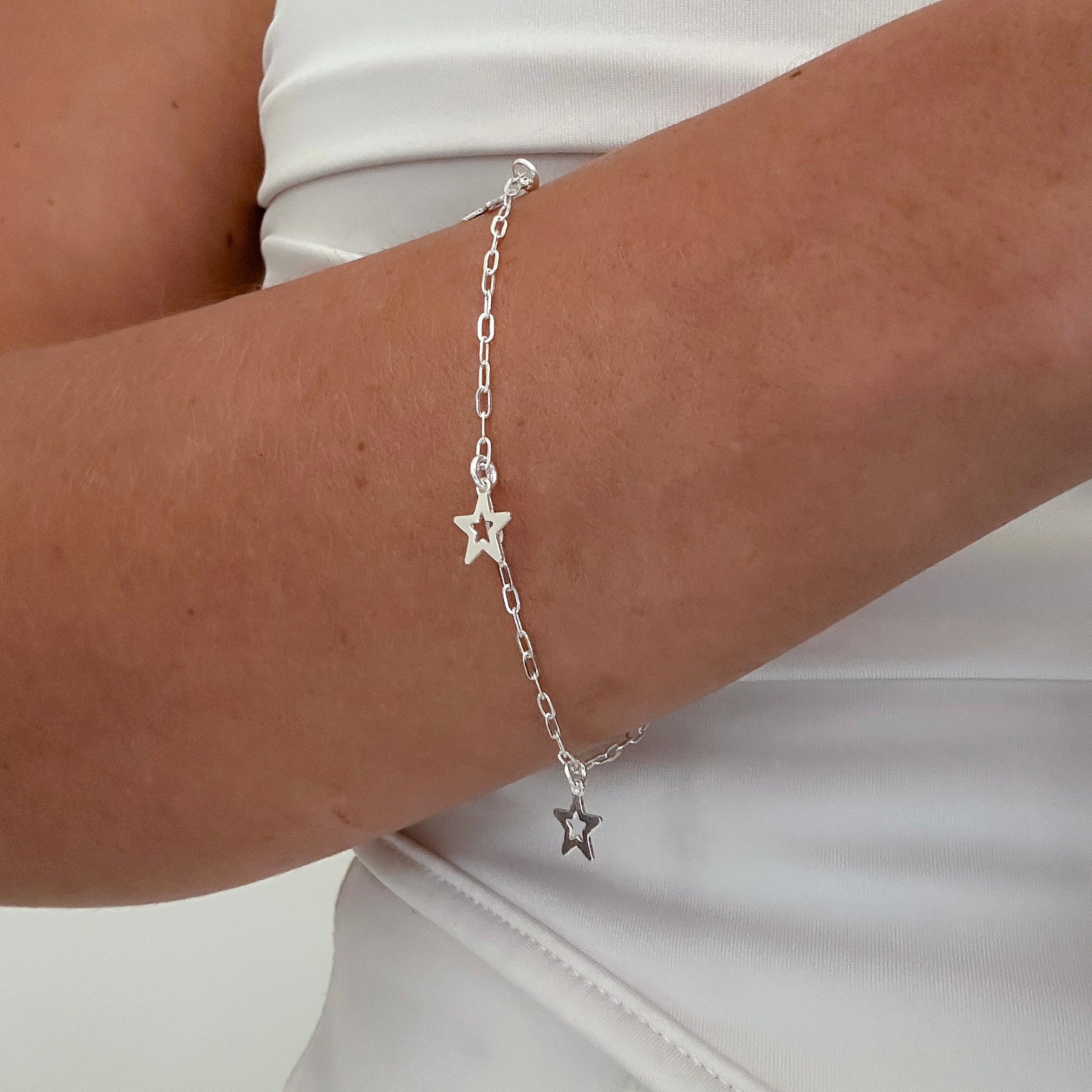PULSEIRA ESTRELAS PENDENTES 18,5CM