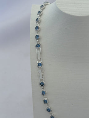 COLAR SWAROVSKI CRAVEJADO AZUL 38+2CM